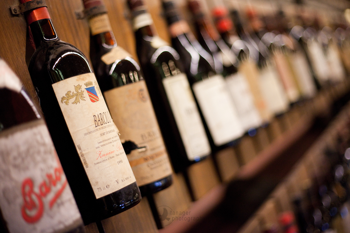 Wine bottles in the wine museum, Barolo, Piedmont, Italy