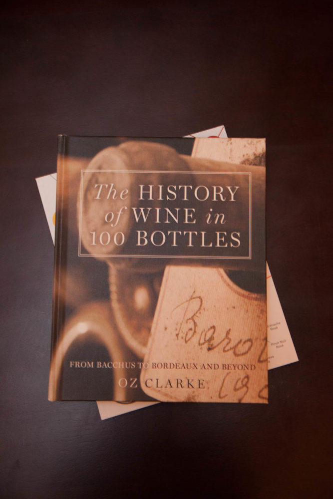 "The History of Wine in 100 Bottles" by Oz Clarke