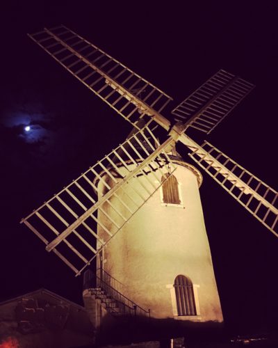 The windmill of Moulin-à-Vent under a waxing moon at night. ©Kevin Day/Opening a Bottle