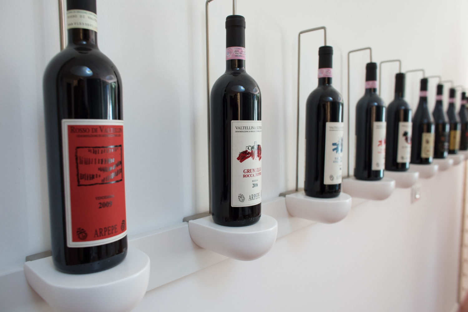 Bottles on display in the ARPEPE tasting room. ©Kevin Day/Opening a Bottle