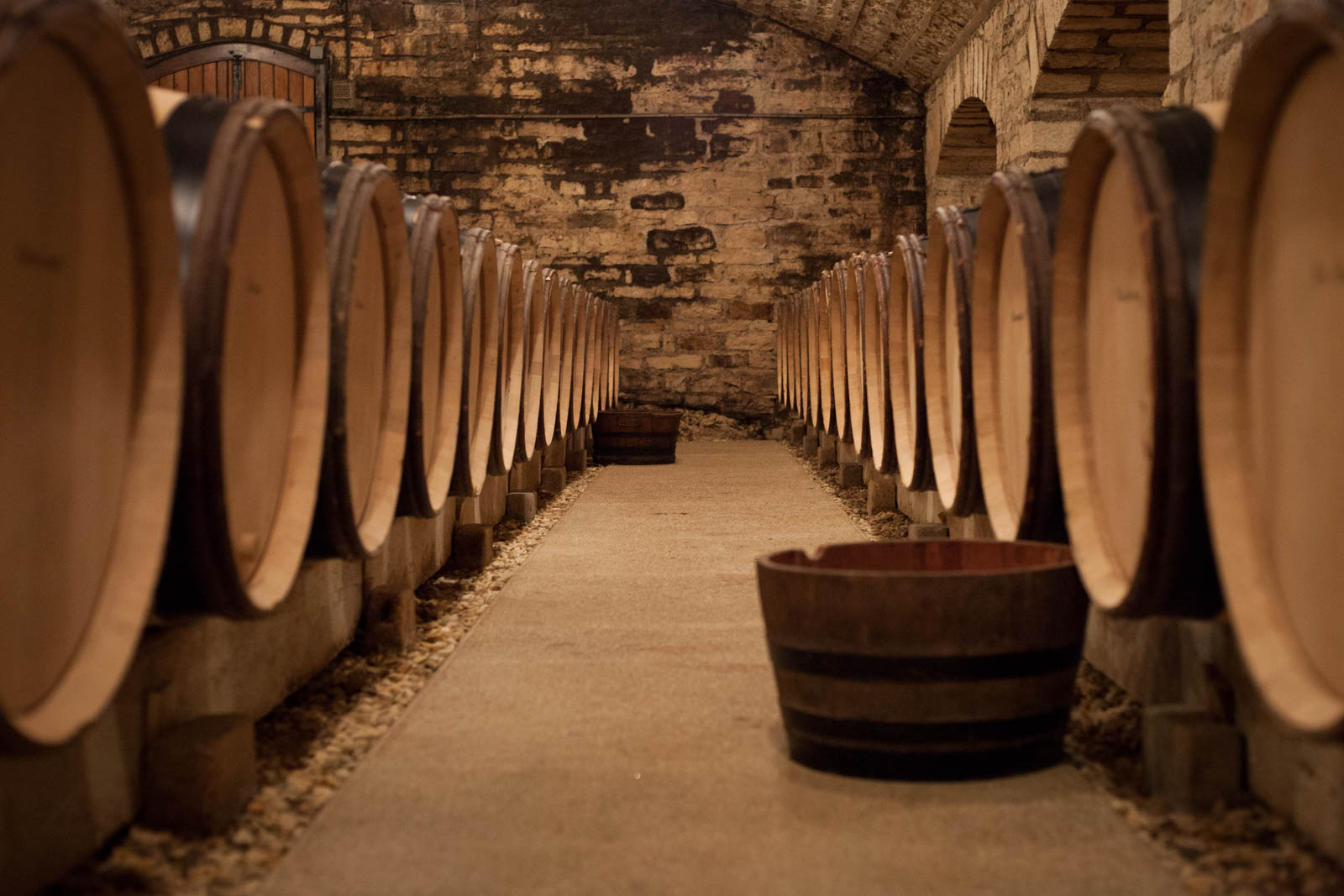 Unfathomable riches lie within these barrels: the 2016 vintage of Echézeaux, Grands Echézeaux and Corton. In typical vintages, the barrels would be stacked in twos, but not with 2016. Frost and hail kept yields very small. ©Kevin Day / Opening a Bottle