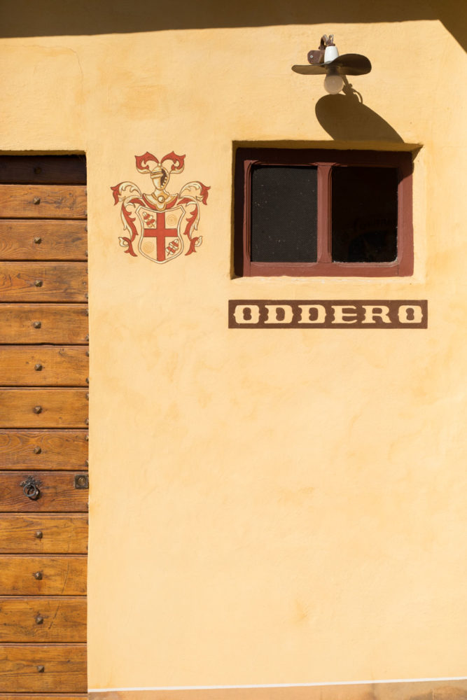 The classic crest of Oddero at the entrance to the cellar. ©Kevin Day/Opening a Bottle