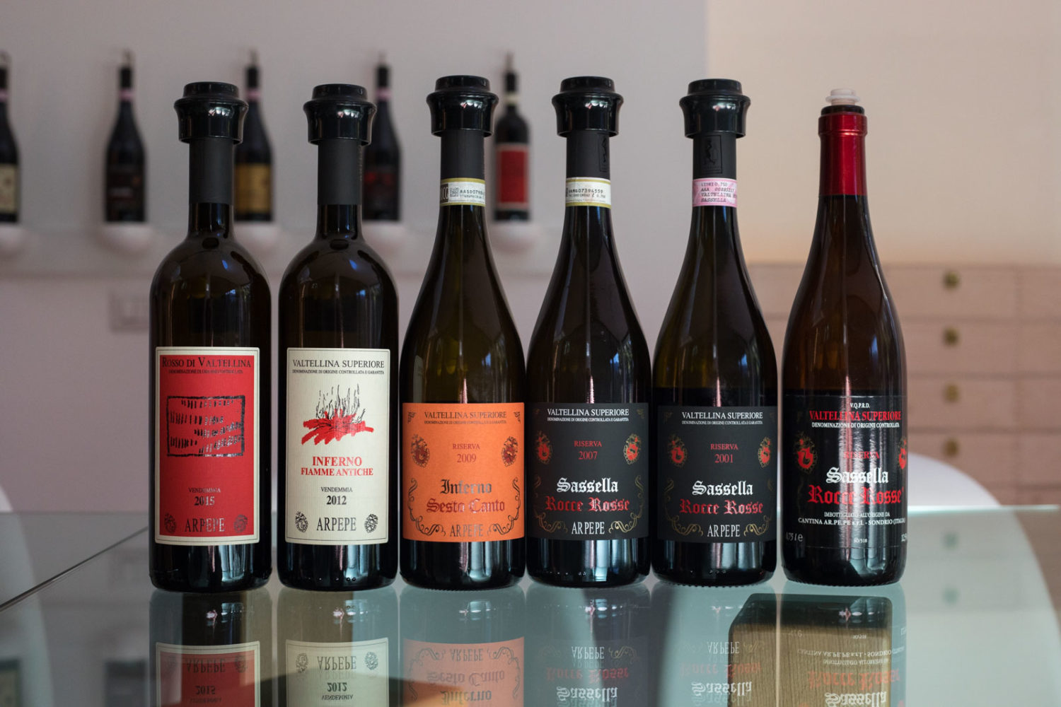 The wines of ARPEPE. Every one of them is different, despite coming from the same grape. And every one of them earned my highest rating. ©Kevin Day/Opening a Bottle.