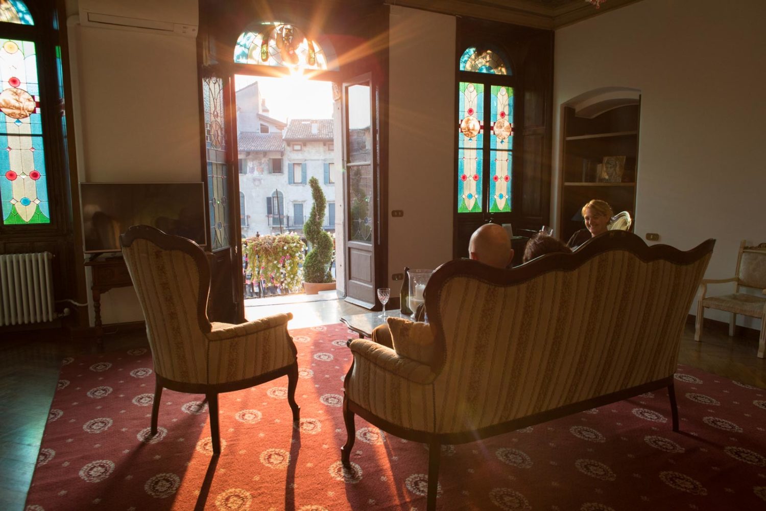 Enjoying the living room at the Piazze Erbe Suite, a two-bedroom suite at the Corte Realdi Suites in Verona. ©Kevin Day/Opening a Bottle