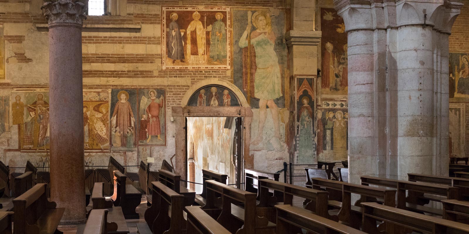 The biblical graphic novel walls of San Zeno's nave. ©Kevin Day/Opening a Bottle