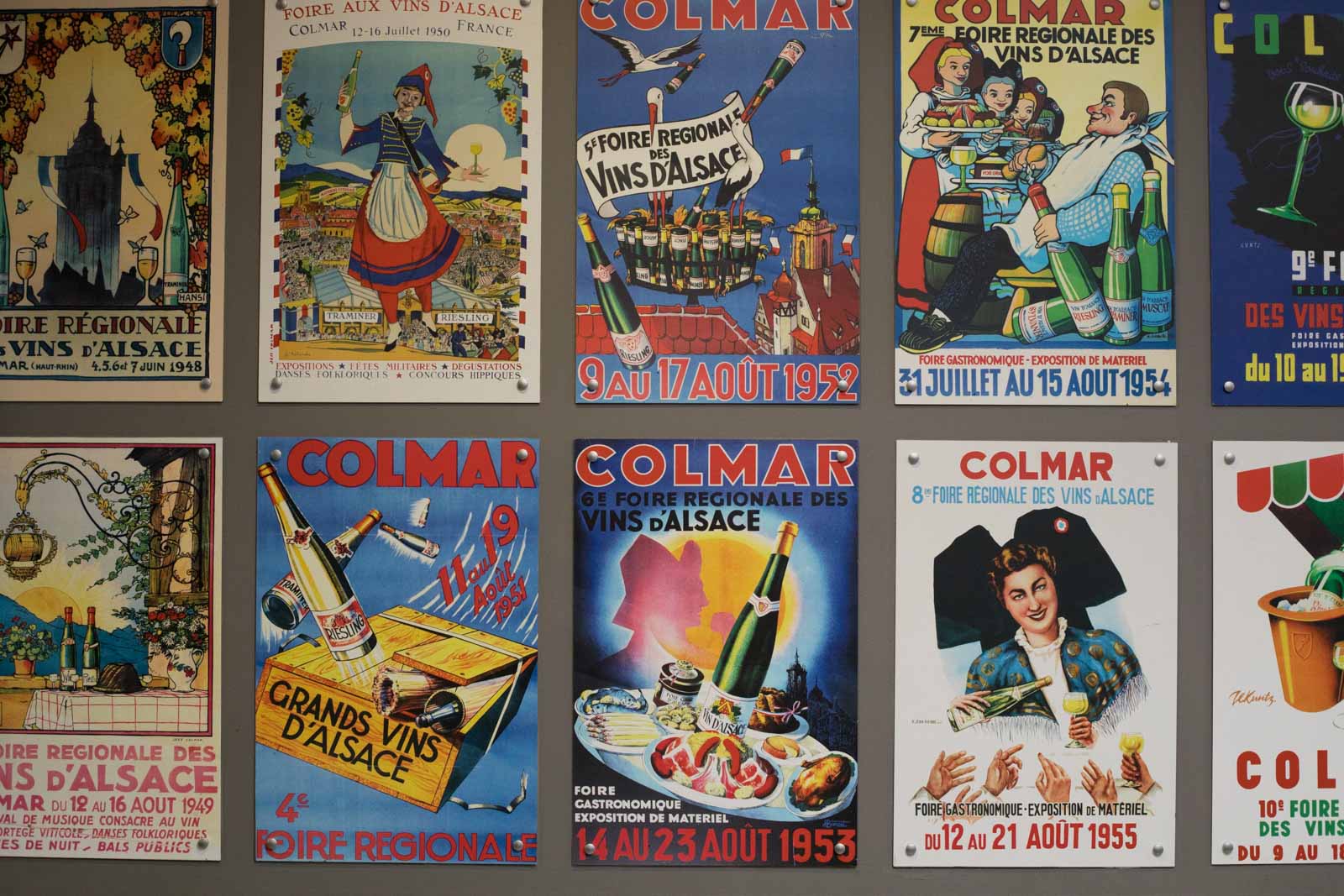 Posters advertising the wine fairs of past years at the Colmar Expo in Alsace, France. ©Kevin Day/Opening a Bottle