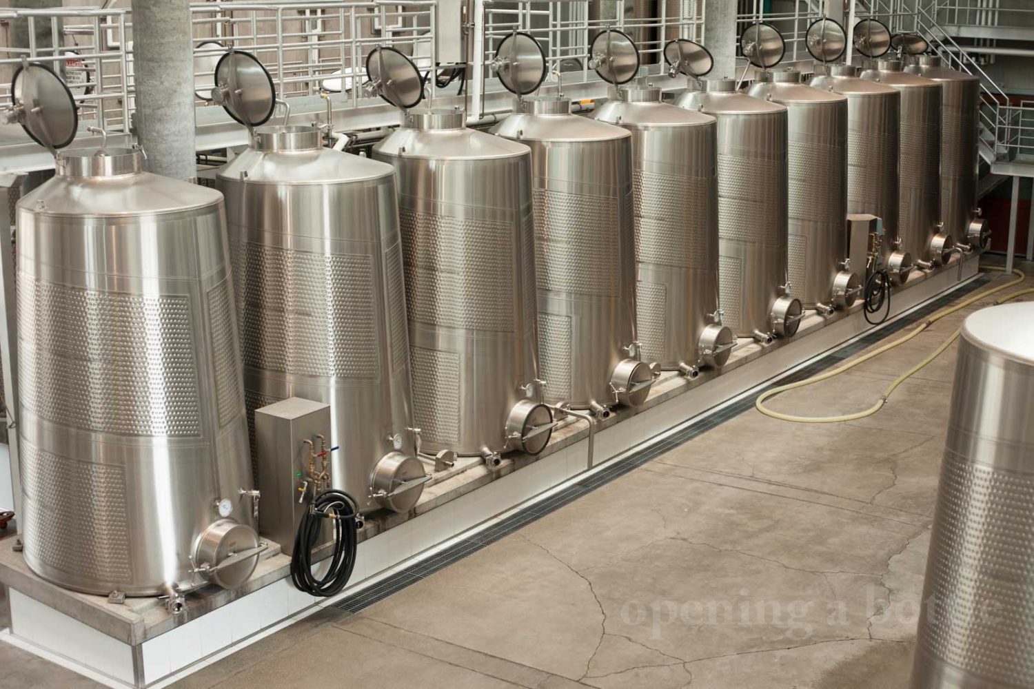 Stainless steel fermentation tanks. ©Kevin Day/Opening a Bottle