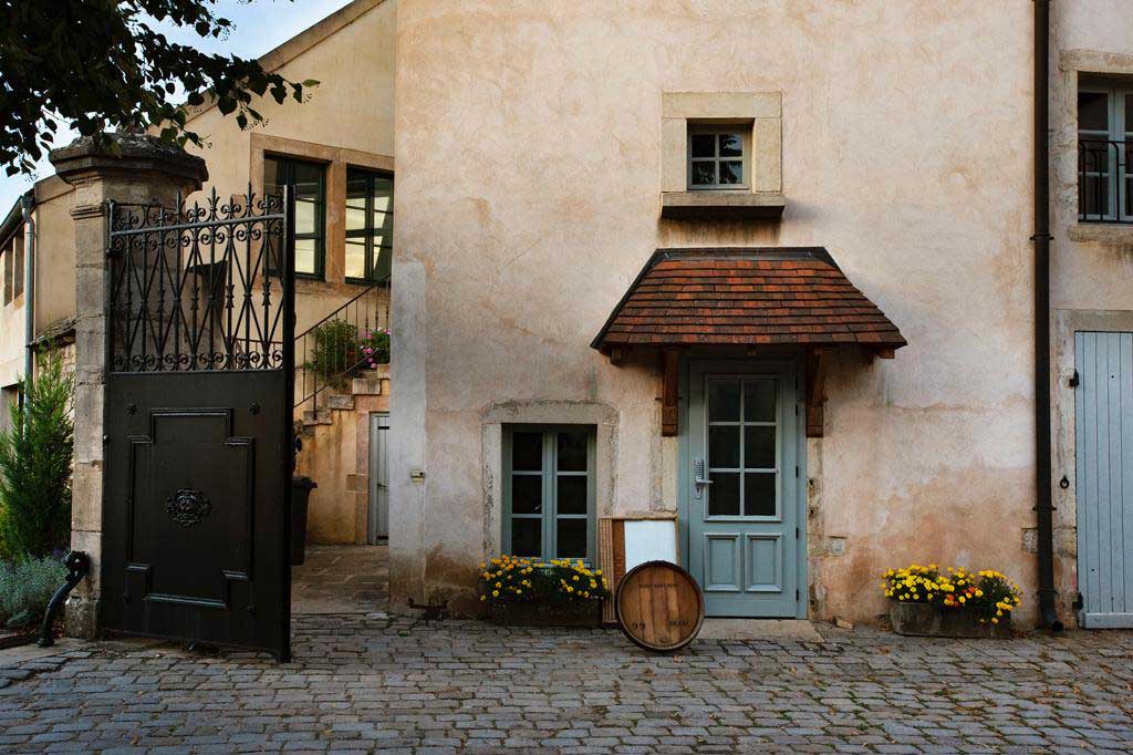 The modest facade of Domaine Dujac — no gilded archways or million-dollar tasting rooms here. ©Alexandra Karosis