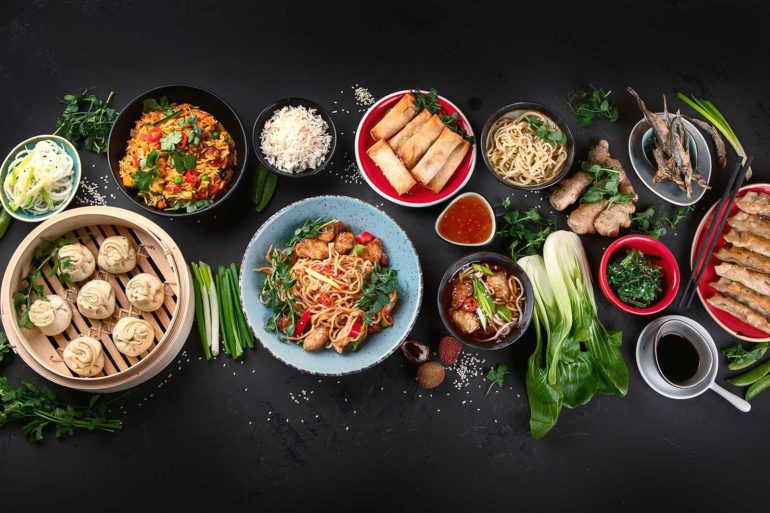 An assortment of Chinese dishes and cuisine on a table