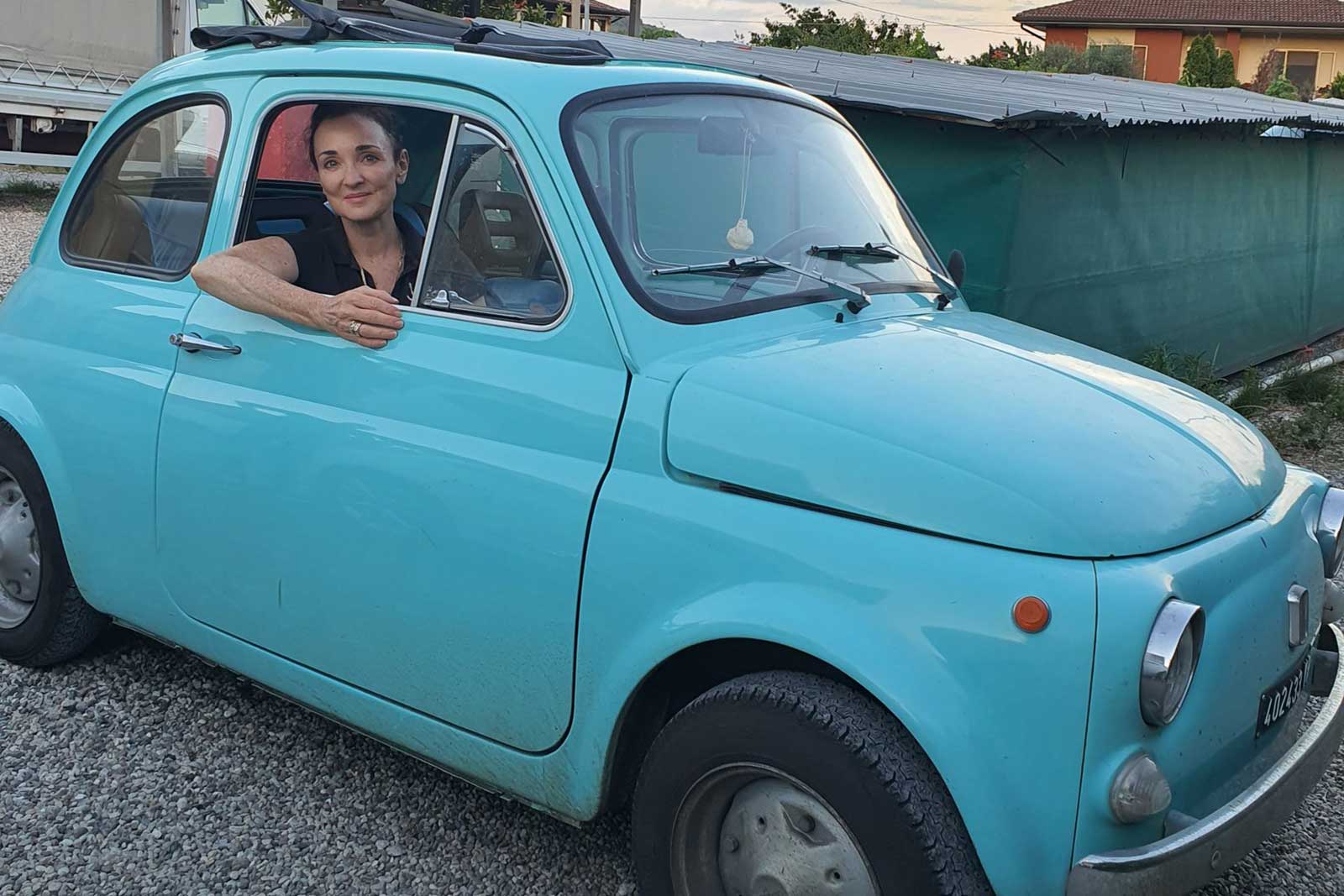 Kerin in an original Fiat 500 at Cantina di Monteforte. ©Cantina di Monteforte