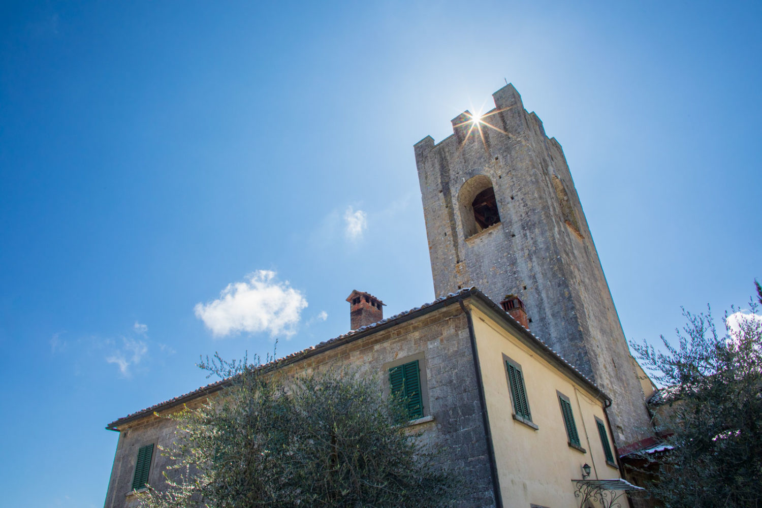 Badia a Coltibuono's abbey backlit by midday sun ©Kevin Day/Opening a Bottle