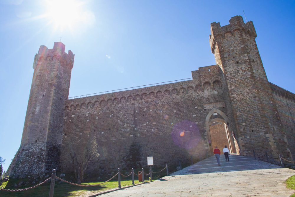 The Fortress of Montalcino with a midday sun and blue sky. ©Kevin Day/Opening a Bottle