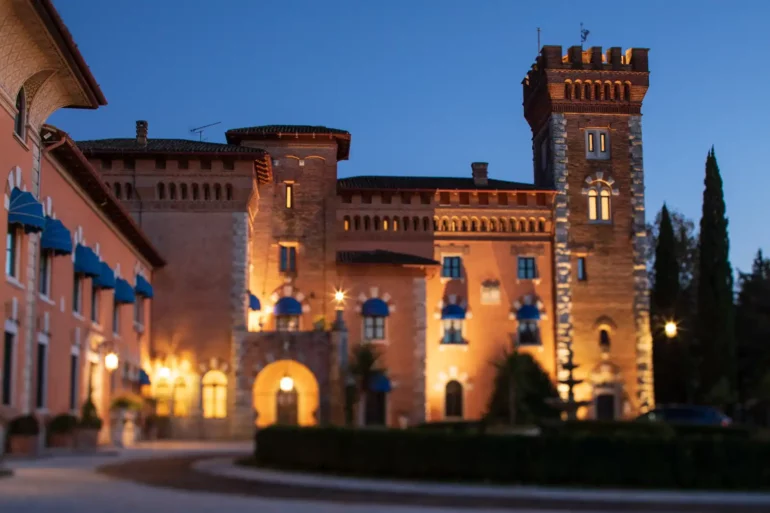 Lights come on at the Castello di Spessa just after sunset in Capriva del Friuli, Italy.