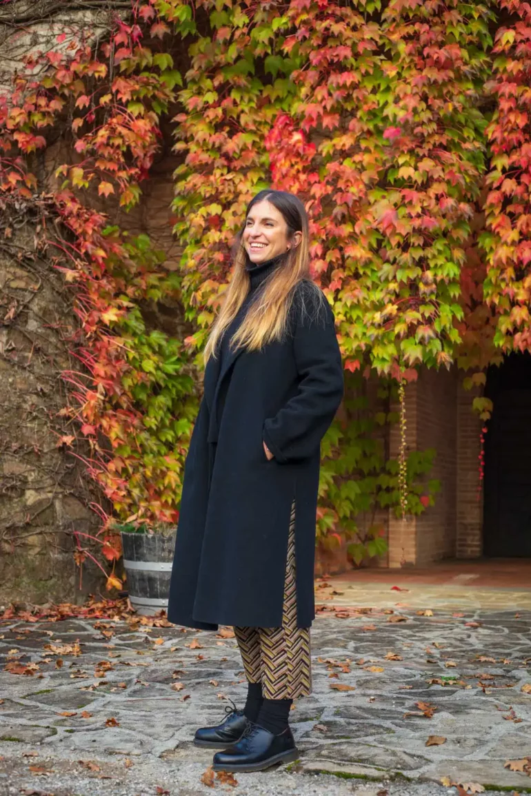 Ilaria Felluga smiles at the ivy-draped cellar door of her Collio winery Russiz Superiore in Friuli, Italy.