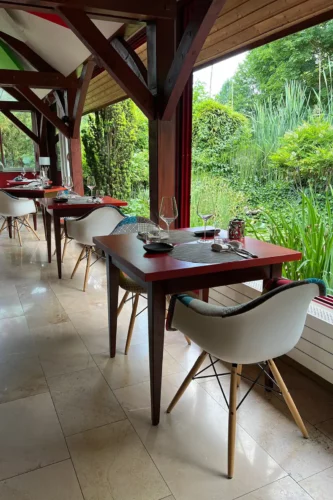 Open-air dining room at Restaurant La Toute Petite Auberge in Vosne-Romanée (Bourgogne), France.