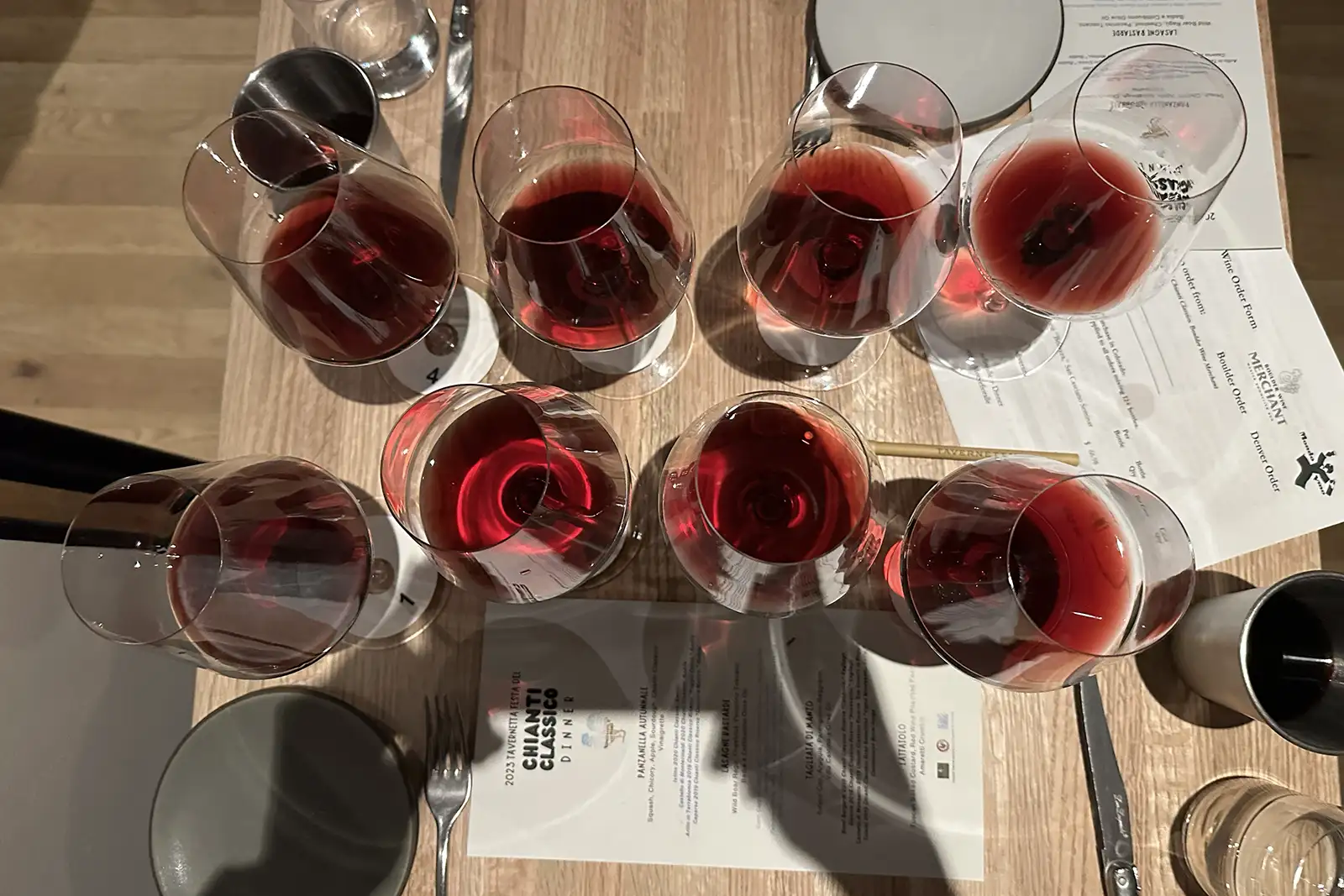 Eight glasses of Chianti Classico arrayed for a comparison tasting at Denver's Festa del Chianti Classico.