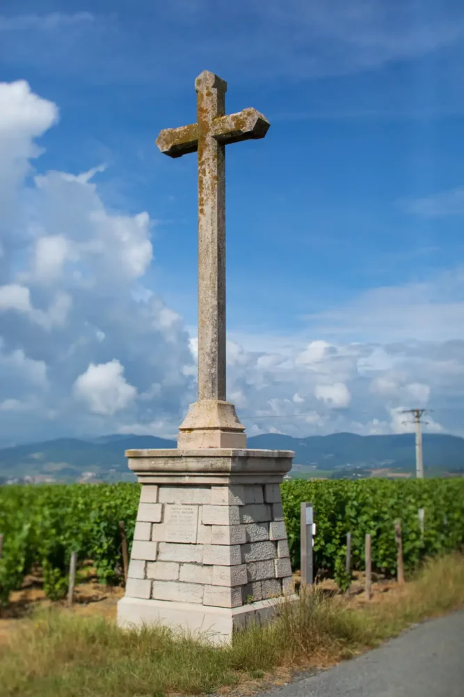 Atop the Côte du Py is a cross marking the historic vintage of 1906. ©Kevin Day/Opening a Bottle