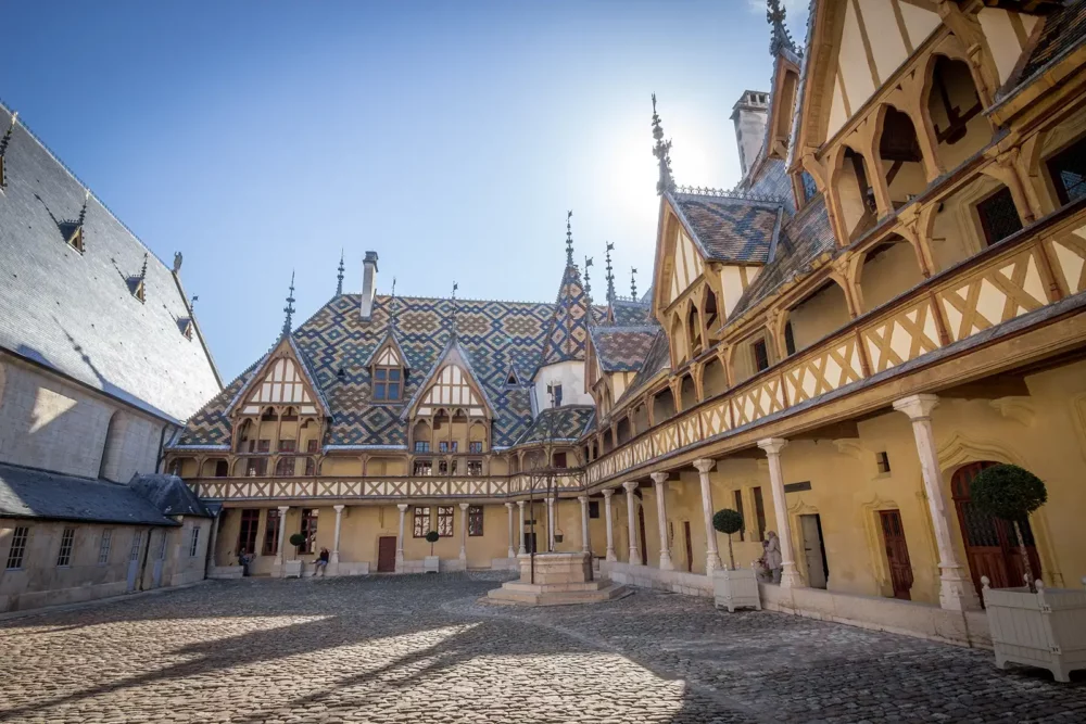 Courtyard view of Hôtel Dieu-Hospice de Beaune in Beaune, France.