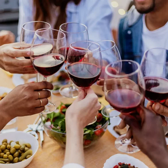 Friends toasting with red wine