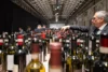 Sommelier service at the Chianti Classico Collection event at Stazione Leopolda in Florence, Italy