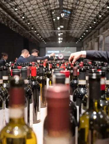 Sommelier service at the Chianti Classico Collection event at Stazione Leopolda in Florence, Italy