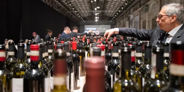 Sommelier service at the Chianti Classico Collection event at Stazione Leopolda in Florence, Italy