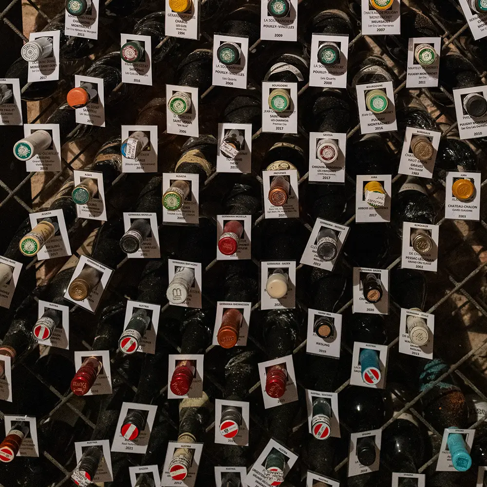 Wines being collected for pleasure in a cellar somewhere in northern Italy. Square photo.
