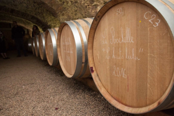 Barrels of Moulin-à-Vent age in the cellar at the château. ©Kevin Day/Opening a Bottle