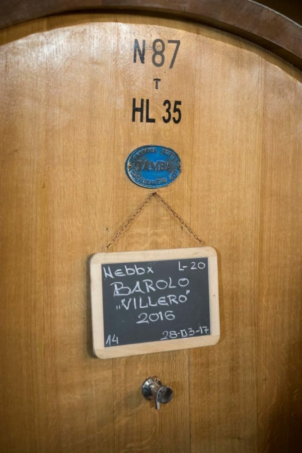 An oak cask holds the precious contents of Nebbiolo juice from the Villero cru. ©Kevin Day/Opening a Bottle