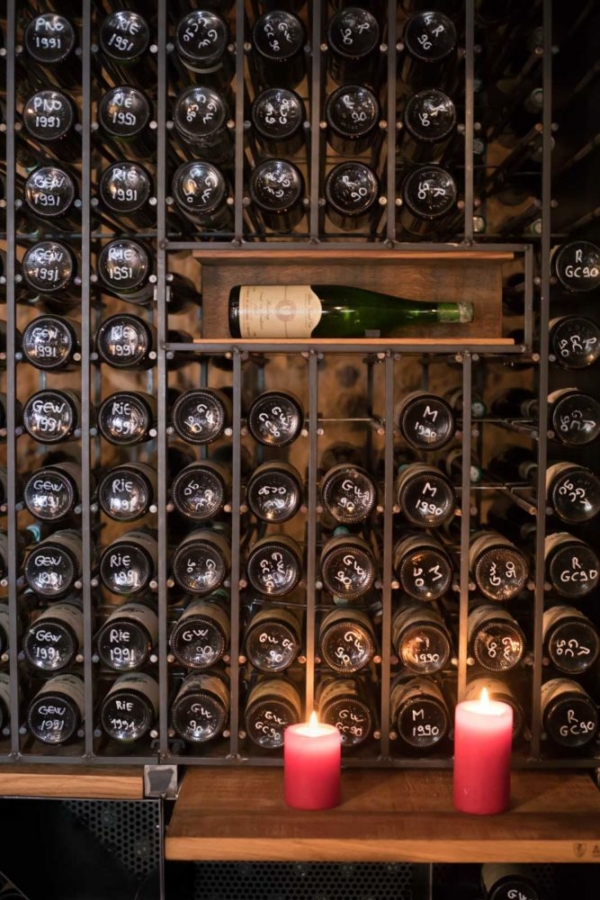 Inside the cellar of the Confrérie des Bienheureux du Frankstein. ©Kevin Day/Opening a Bottle