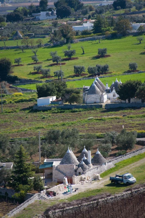 The landscape around Locorotondo, Puglia is defined by trulli, historic white-stone huts and dwellings. ©Kevin Day / Opening a Bottle The landscape around Locorotondo, Puglia is defined by trulli, historic white-stone huts and dwellings. ©Kevin Day / Opening a Bottle