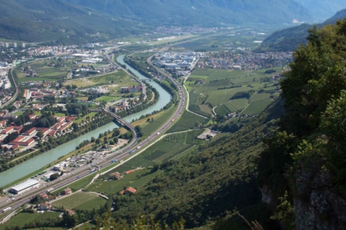 A view of the Adige River from above Trento, with vineyards — many owned by Ferrari — on the right bank. ©Kevin Day/Opening a Bottle