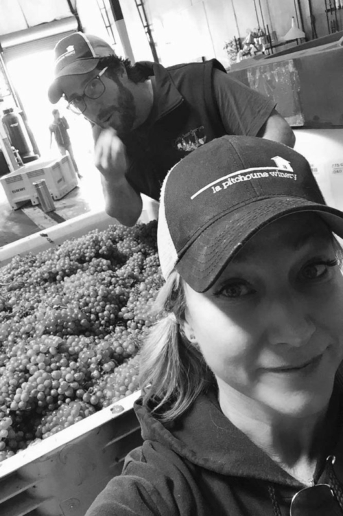 The author and winemaker Andrew Berge survey their grapes in the winery. ©Tracy Nielsen/La Pitchoune