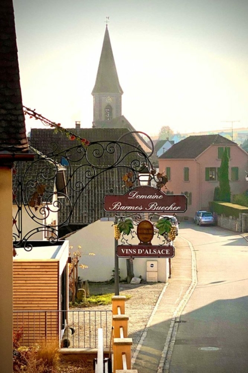 The village of Wettolsheim and the front door of the domaine. ©Barmès-Buecher