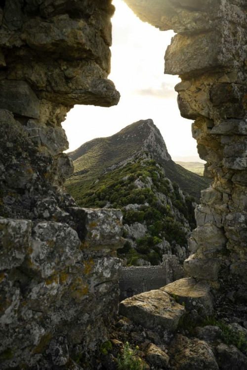 "The light of Languedoc spreading its lavish warmth over all ..." A view of the crags of Hortus in Pic St.-Loup, one of Andrew's favorite places to explore wine. (Stock photo)