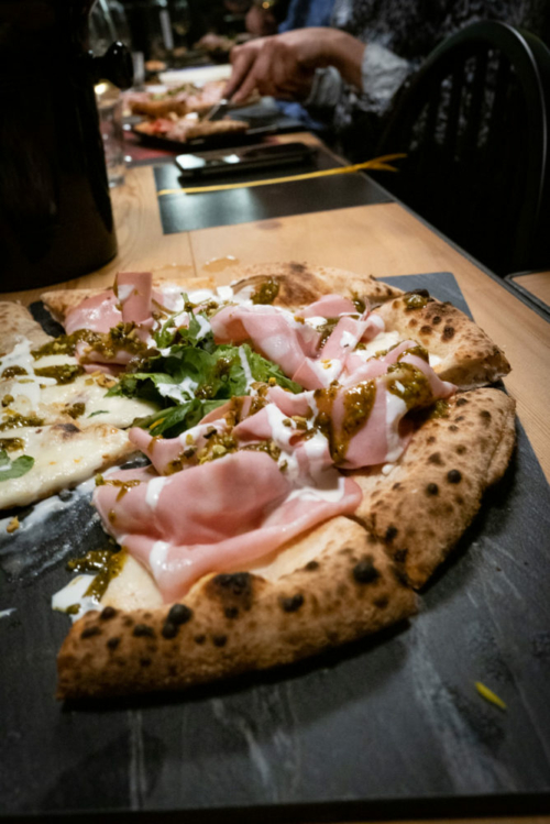 Ham and pistachio pesto pizza at Flamòr. ©Kevin Day/Opening a Bottle